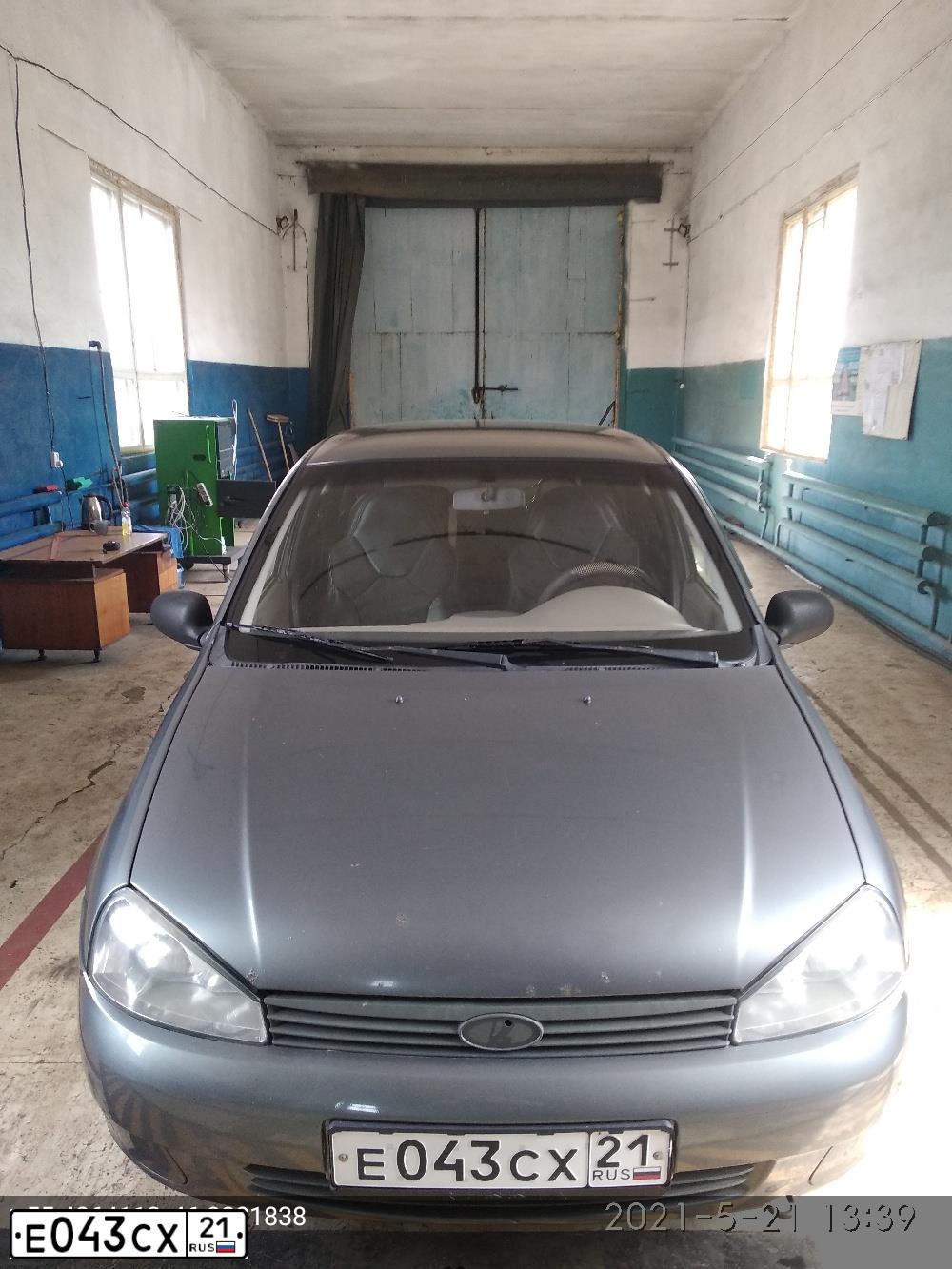 Фото автомобиля LADA 1119 KALINA, 2008 — госномер М157РМ21. Цвет: ТЕМНО-СЕРЫЙ МЕТАЛЛИК