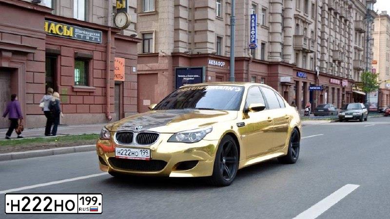 Фото автомобиля BMW M5, 2008 — госномер Т116ЕН77. Цвет: КРАСНЫЙ ТЕМНЫЙ