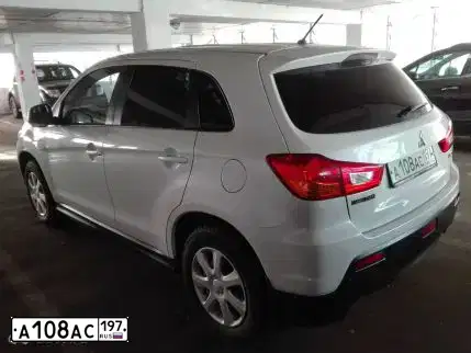 Фото автомобиля MITSUBISHI ASX, 2011 — госномер Р927ВМ27. Цвет: Белый