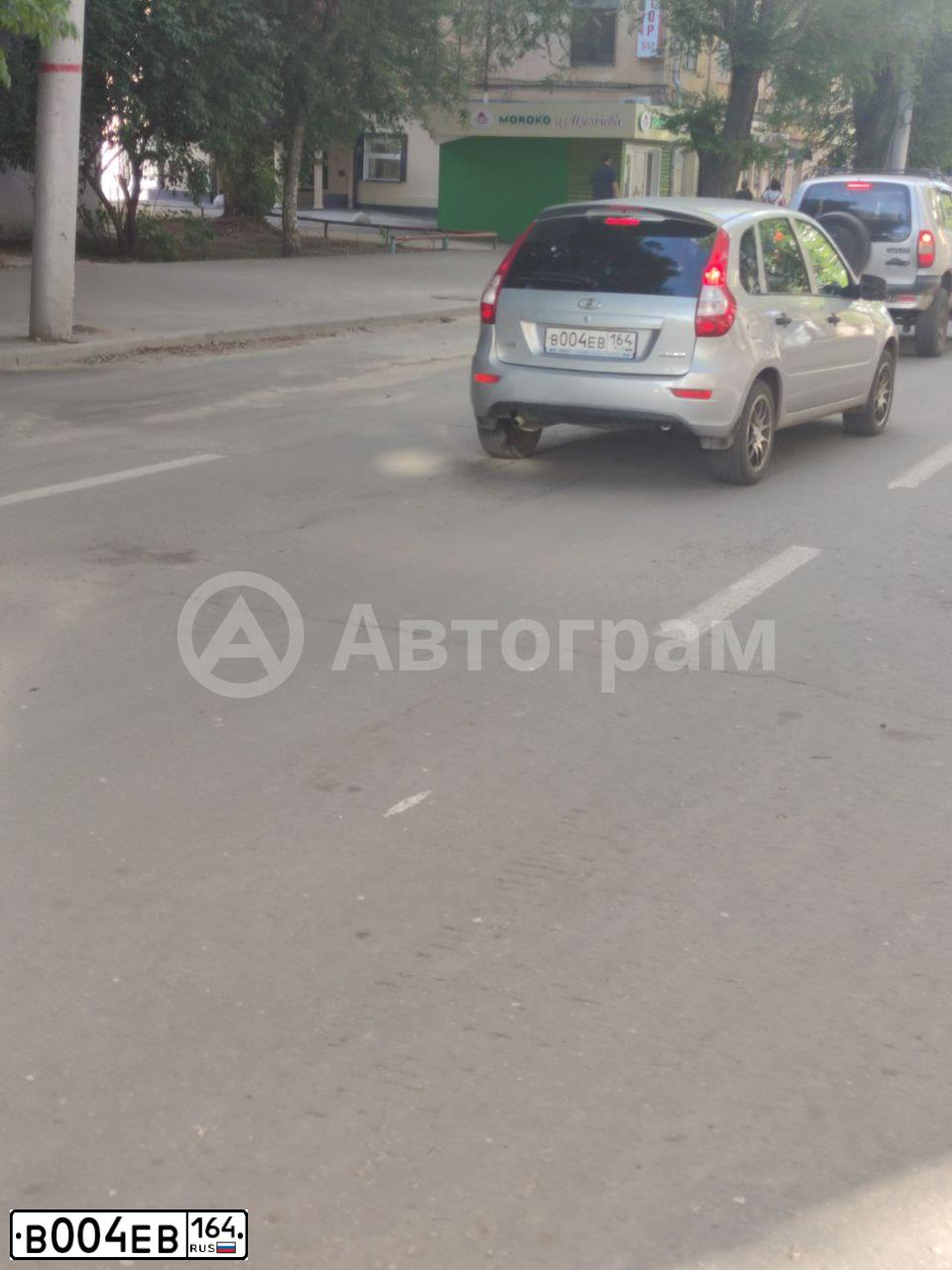 Фото автомобиля LADA 2192 KALINA, 2014 — госномер В004ЕВ164. Цвет: СЕРЕБРИСТЫЙ