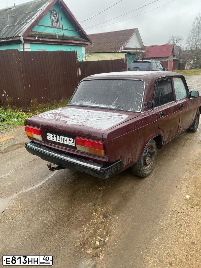Фото автомобиля LADA 2107, 2006 — госномер Е813НН40. Цвет: ТЕМНО-ВИШНЕВЫЙ
