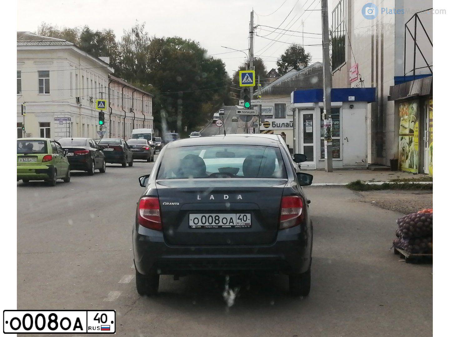 Фото автомобиля LADA 2190 GRANTA, 2018 — госномер О008ОА40. Цвет: серебристо-темно-серый