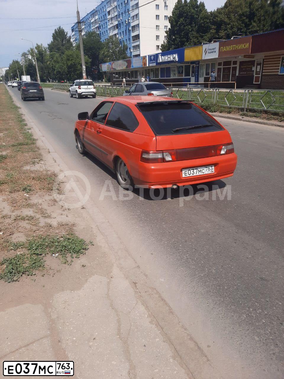 Фото автомобиля LADA 2112, 2007 — госномер М350ВА156. Цвет: ЯРКО-КРАСНЫЙ