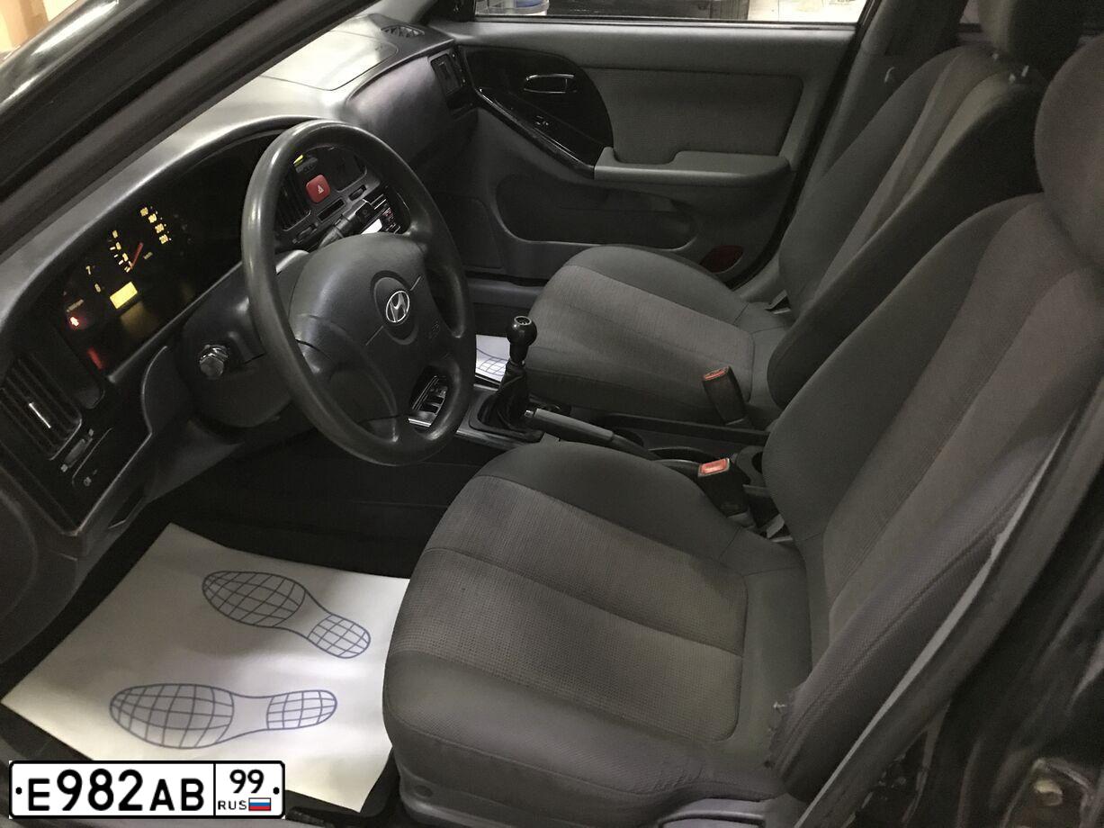 Фото автомобиля HYUNDAI ELANTRA, 2004 — госномер Р847КЕ181. Цвет: ЧЕРНЫЙ