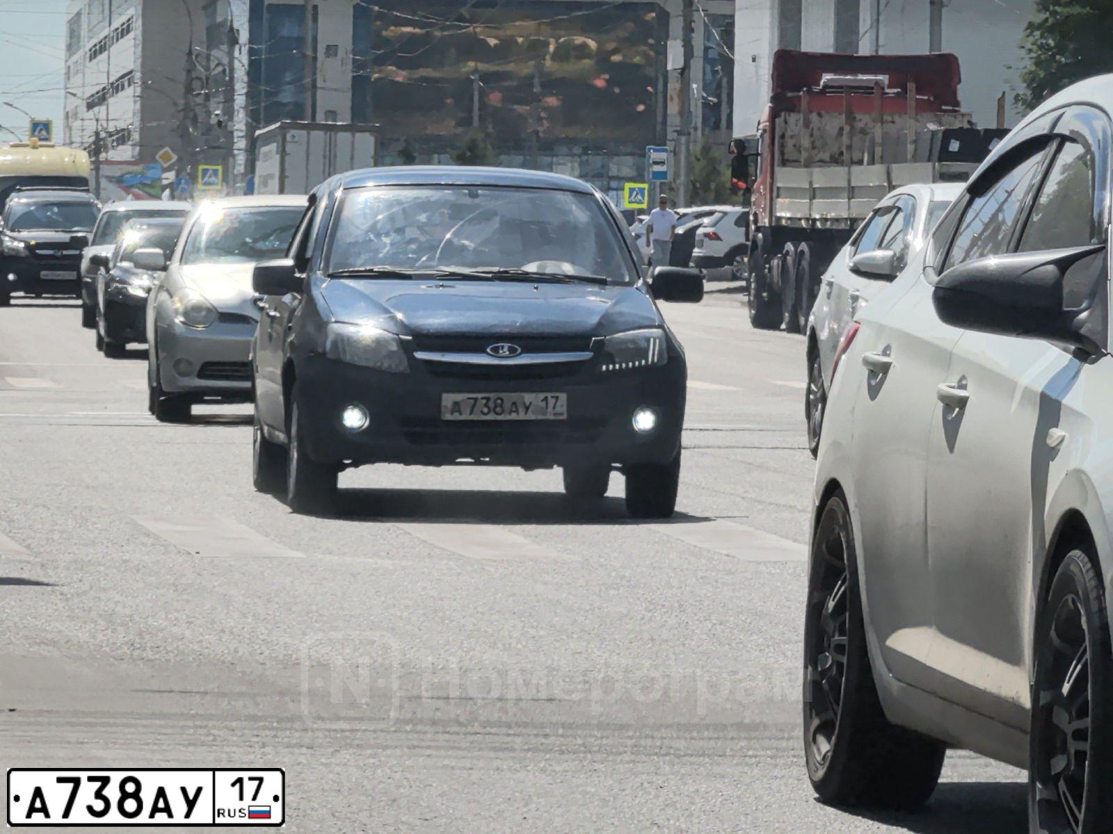 Фото автомобиля LADA 2190 GRANTA, 2012 — госномер А738АУ17. Цвет: СЕРО-СИНИЙ