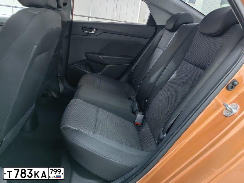 Фото автомобиля HYUNDAI SOLARIS, 2018 — госномер Т862ТХ790. Цвет: Оранжевый