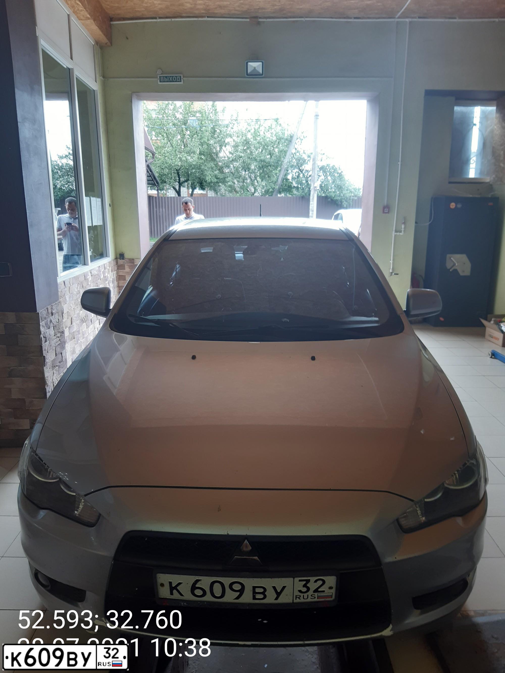 Фото автомобиля MITSUBISHI LANCER, 2008 — госномер К609ВУ32. Цвет: серебристый