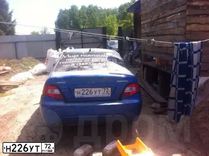 Фото автомобиля DAEWOO NEXIA, 2011 — госномер Н226УТ72. Цвет: синий