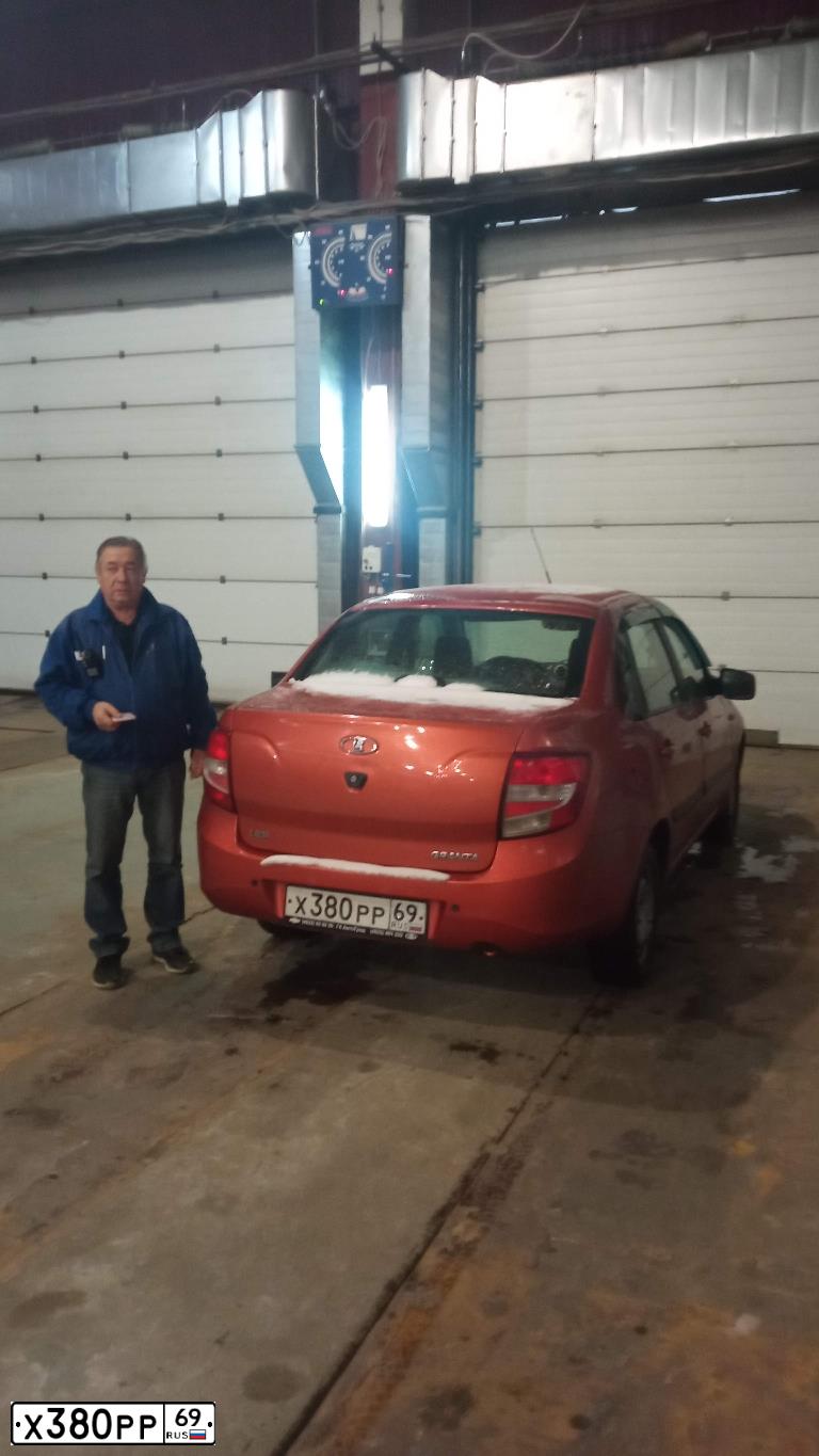 Фото автомобиля LADA GRANTA, 2013 — госномер К109МТ07. Цвет: Оранжевый