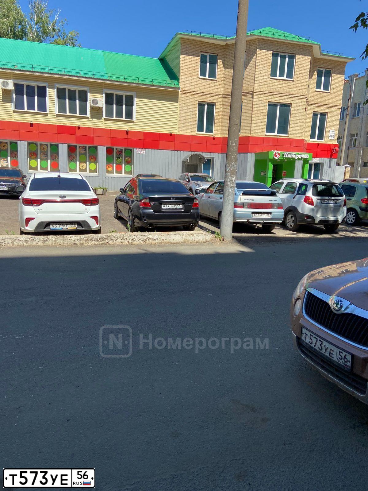 Фото автомобиля SKODA YETI, 2012 — госномер Т573УЕ56. Цвет: ОРАНЖЕВО-КОРИЧНЕВЫЙ