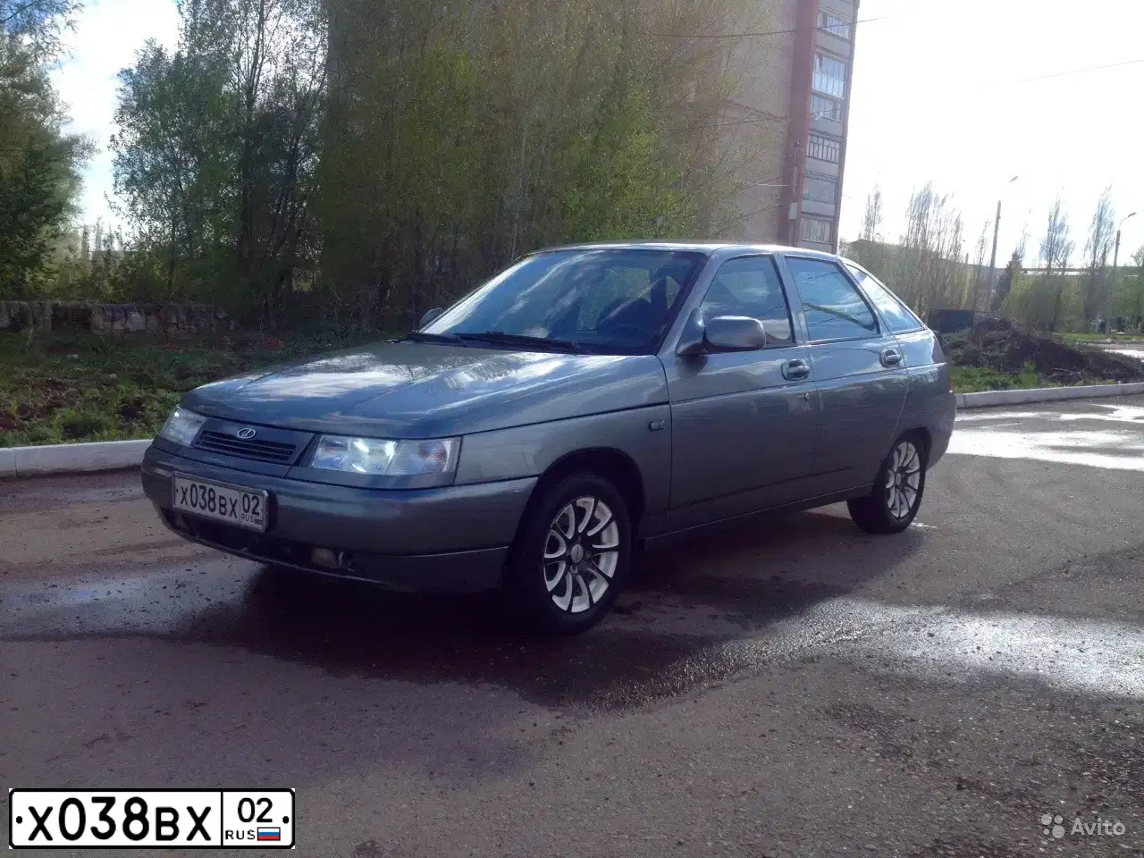 Фото автомобиля LADA 2112 LADA, 2005 — госномер Х038ВХ02. Цвет: средний серо-зеленый металлик