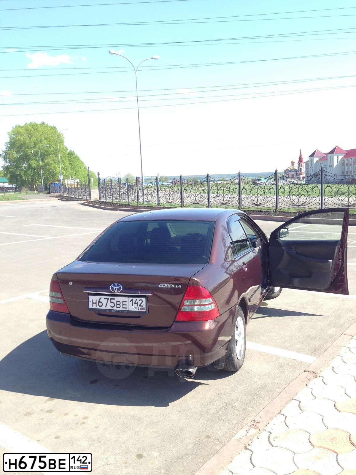 Фото автомобиля TOYOTA COROLLA, 2003 — госномер Н675ВЕ142. Цвет: ТЕМНО-КРАСНЫЙ