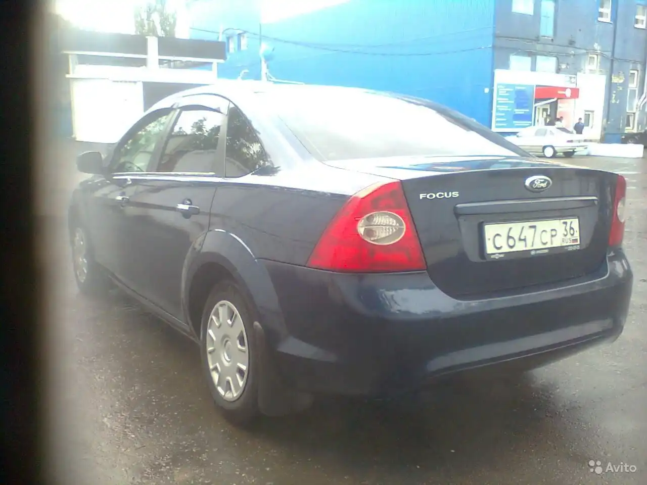 Фото автомобиля FORD FOCUS, 2010 — госномер Х914РН31. Цвет: Темно-синий
