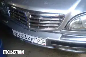 Фото автомобиля GAZ Z 3221 GAZEL, 2004 — госномер В003ХЕ123. Цвет: ГРАНАТ