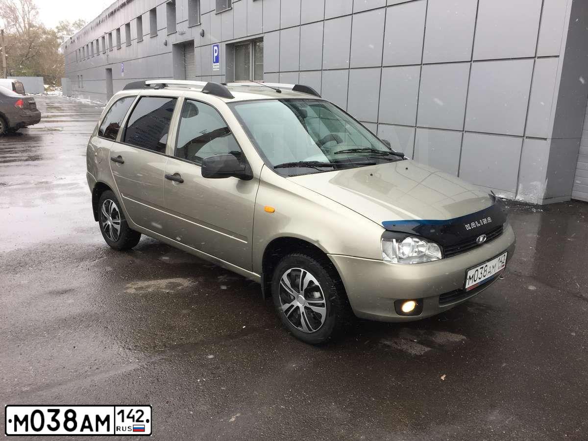 Фото автомобиля LADA 1117 KALINA, 2012 — госномер А869ЕР142. Цвет: СЕРО-БЕЖЕВЫЙ