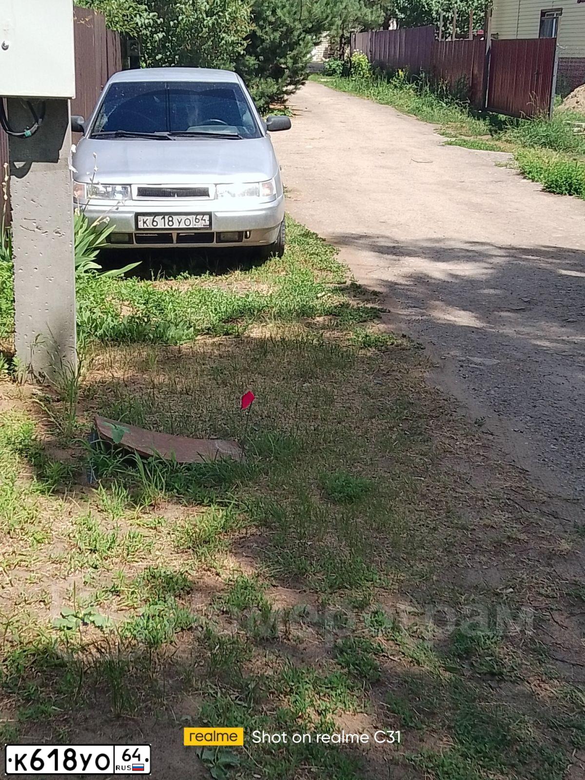 Фото автомобиля LADA 2112, 2006 — госномер К618УО64. Цвет: СВЕТЛО СЕРЕБРИСТЫЙ МЕТАЛЛ