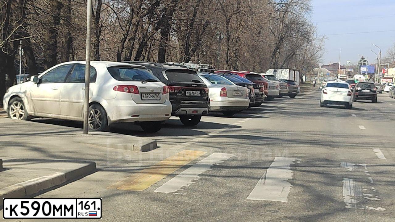 Фото автомобиля CHEVROLET LACETTI, 2010 — госномер К590ММ161. Цвет: БЕЛЫЙ