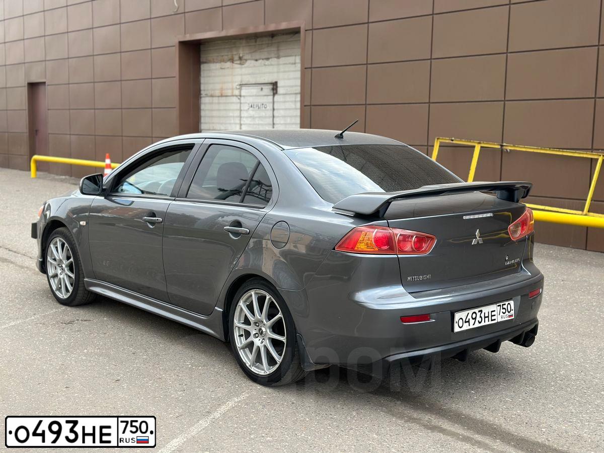Фото автомобиля MITSUBISHI LANCER, 2008 — госномер А366ВХ323. Цвет: СЕРЫЙ