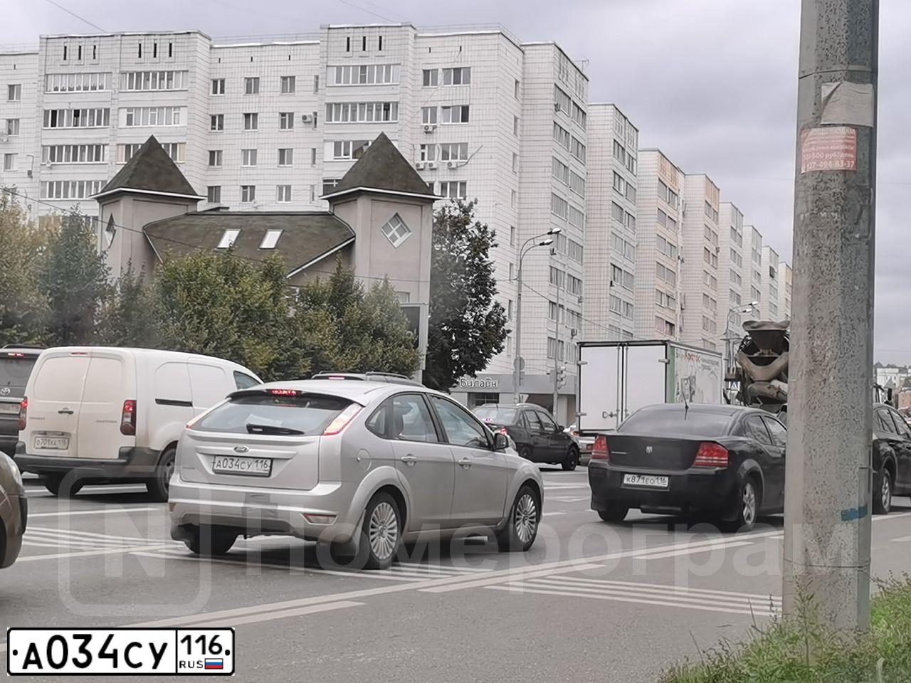 Фото автомобиля FORD FOCUS, 2011 — госномер А034СУ116. Цвет: серебристый