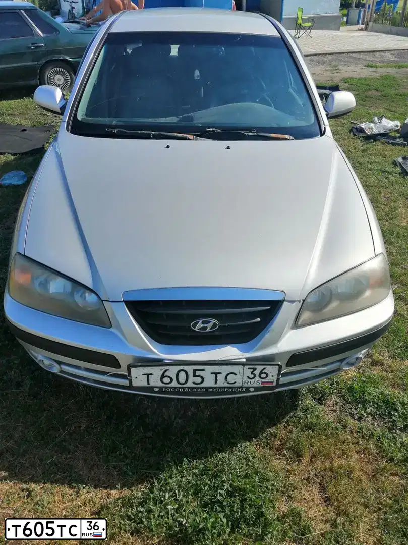Фото автомобиля HYUNDAI ELANTRA, 2005 — госномер Р422АВ180. Цвет: Серебристый