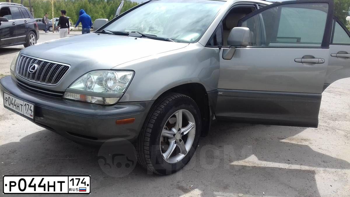 Фото автомобиля LEXUS RX, 2003 — госномер Р044НТ174. Цвет: СЕРЫЙ