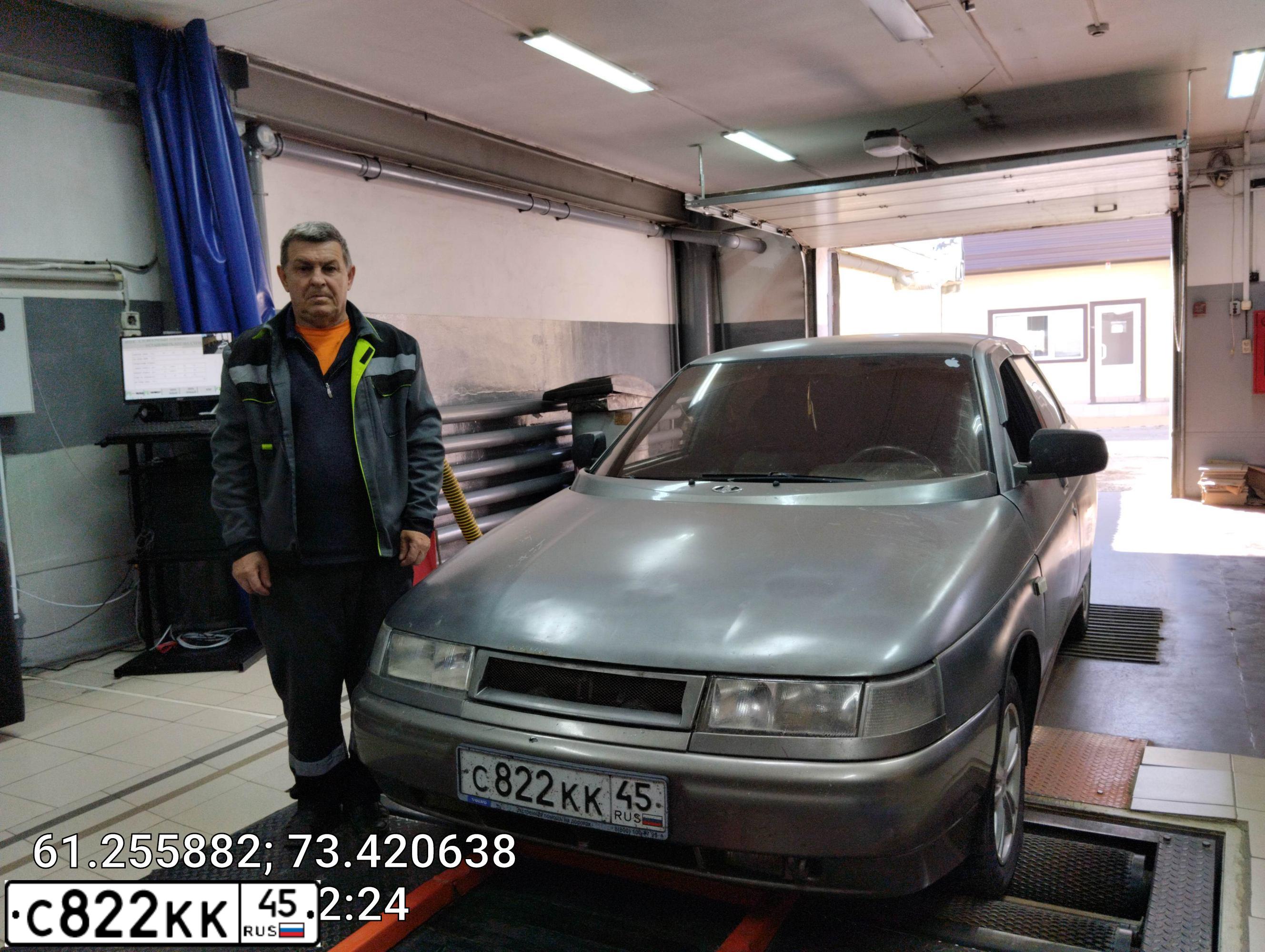 Фото автомобиля LADA 2112, 2002 — госномер Е482РТ186. Цвет: СЕРЕБРИСТЫЙ СЕРО-ЗЕЛЕНЫЙ