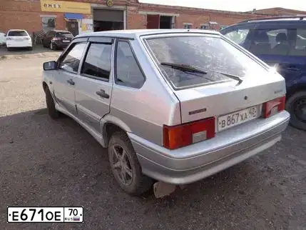 Фото автомобиля LADA 2109 SAMARA, 1997 — госномер Е671ОЕ70. Цвет: ТЕМНО-СИНИЙ
