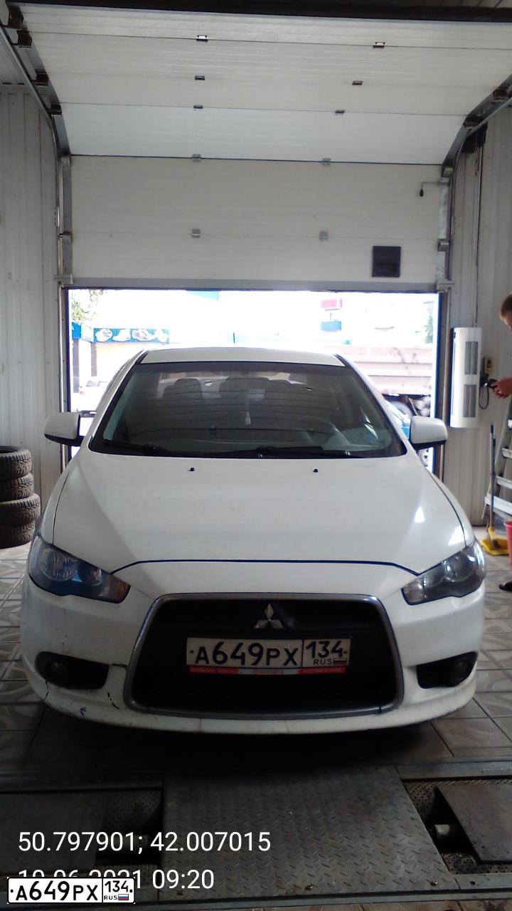 Фото автомобиля MITSUBISHI LANCER, 2011 — госномер А649РХ134. Цвет: Белый