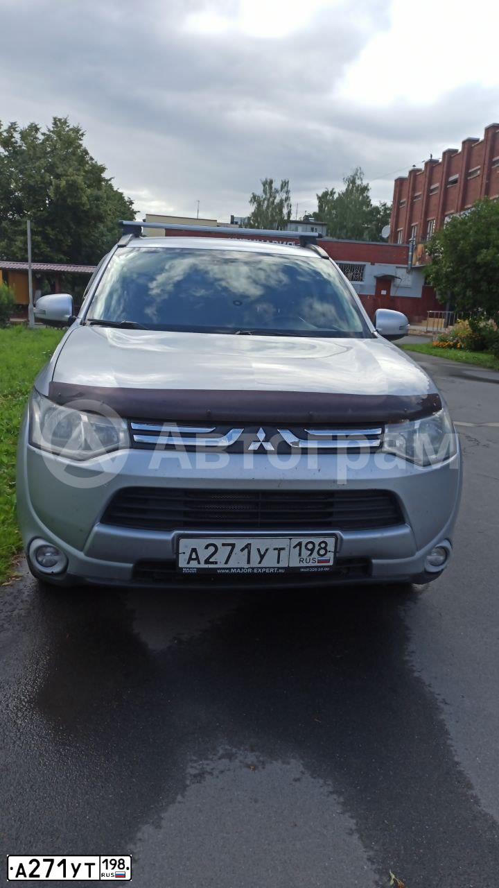 Фото автомобиля MITSUBISHI OUTLANDER, 2012 — госномер С409ВС138. Цвет: ЧЕРНЫЙ