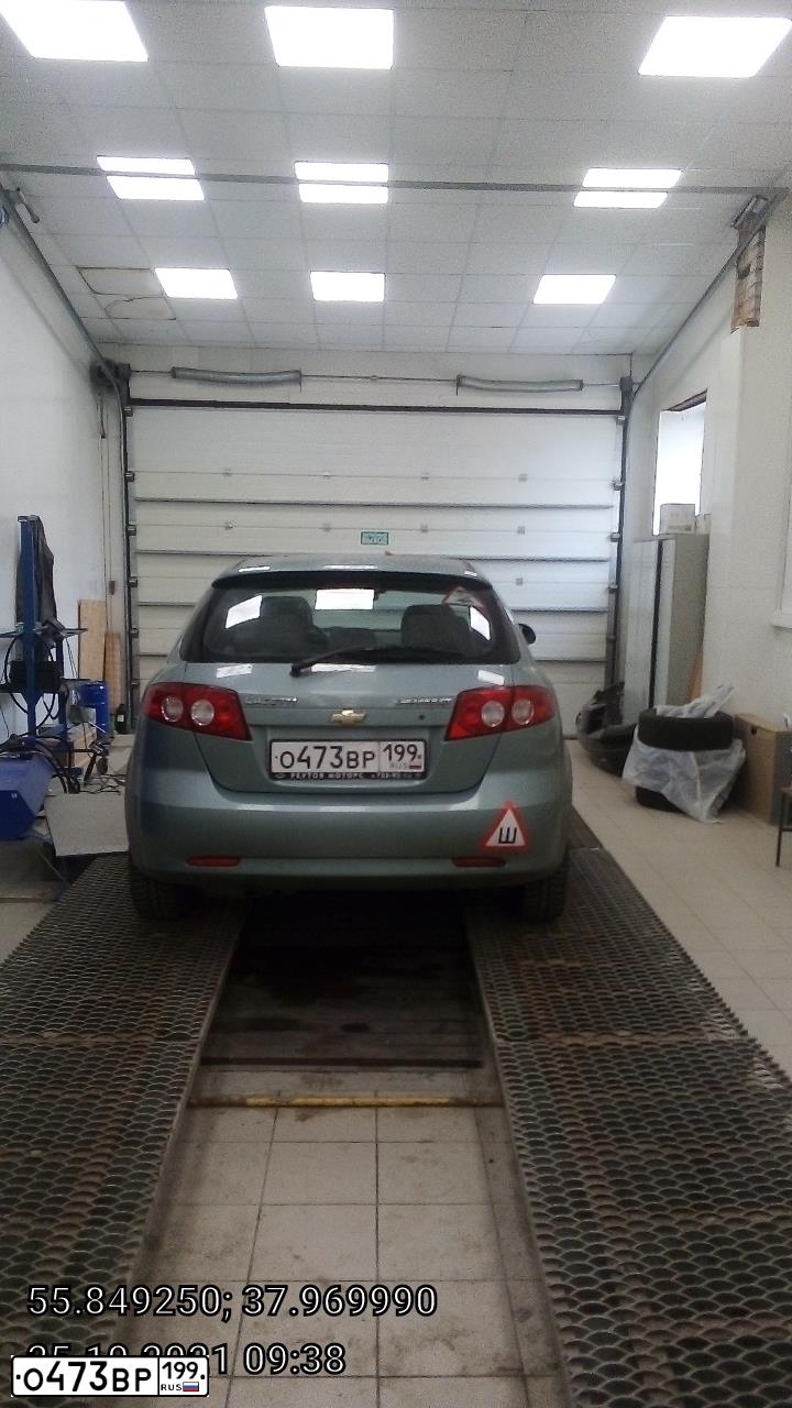 Фото автомобиля CHEVROLET LACETTI, 2007 — госномер О473ВР199. Цвет: СЕРО-ЗЕЛЕНЫЙ