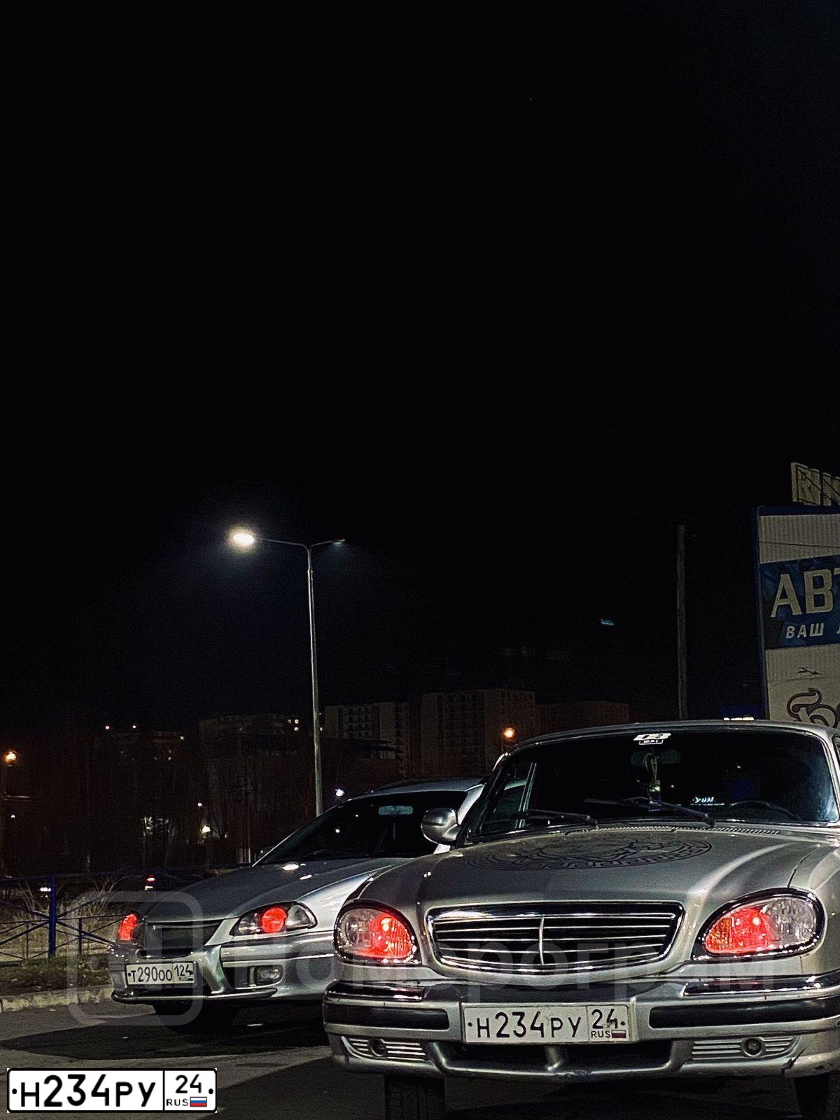 Фото автомобиля GAZ 3110 WOLGA, 2005 — госномер Н234РУ24. Цвет: СИЛЬВЕР