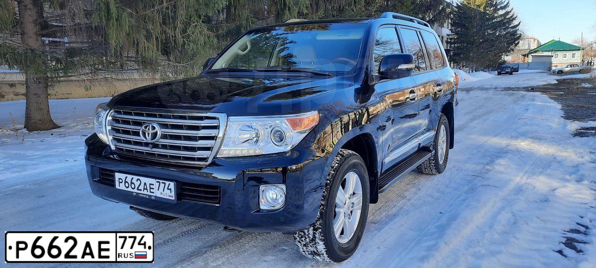 Фото автомобиля TOYOTA LANDCRUISER 200, 2012 — госномер Р662АЕ774. Цвет: ЧЕРНЫЙ