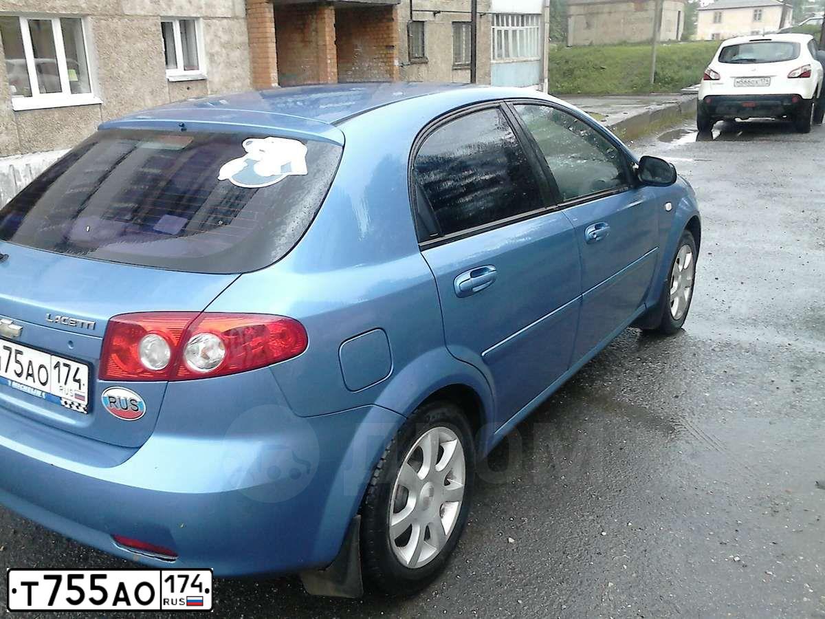 Фото автомобиля FIAT ALBEA, 2007 — госномер Р253ЕТ774. Цвет: КРАСНЫЙ СЦИЛЛА