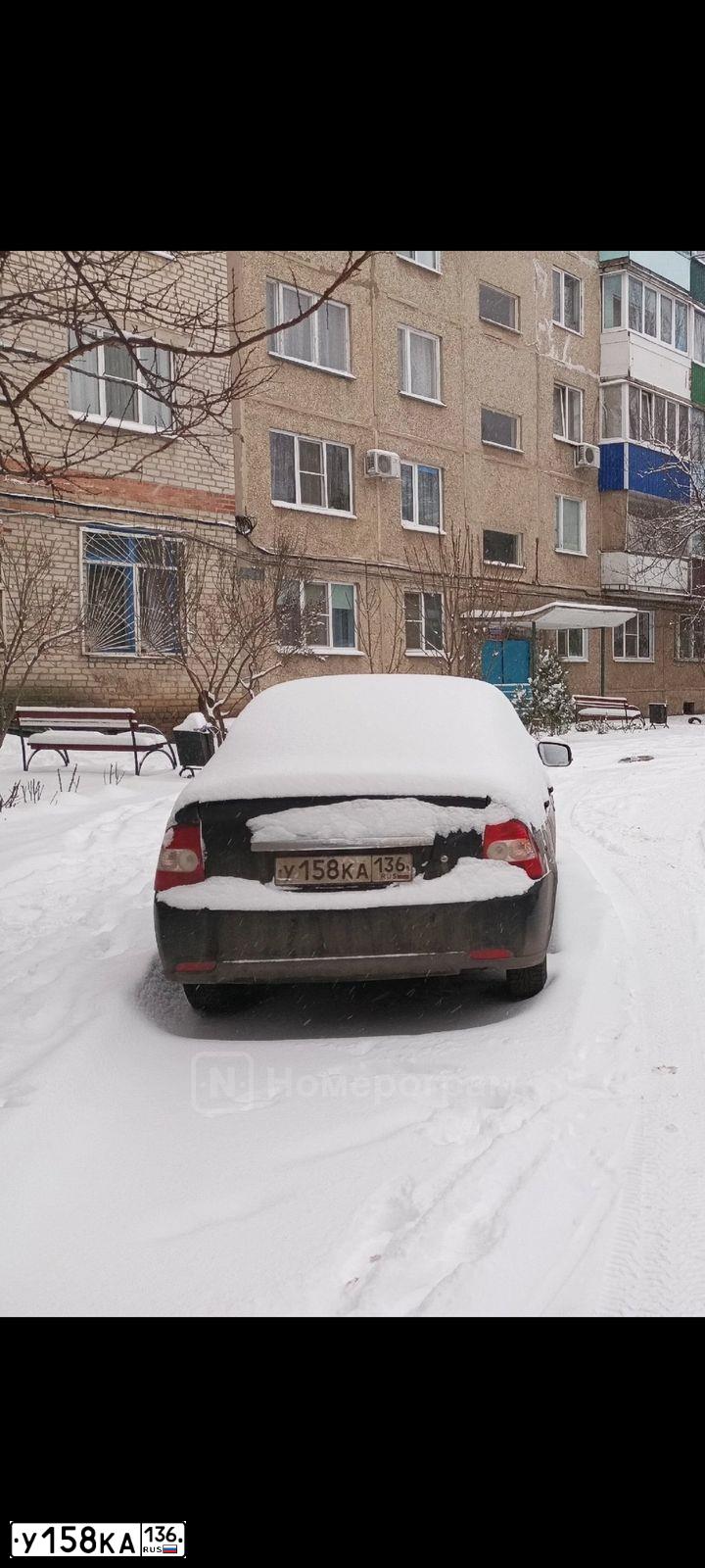 Фото автомобиля ВАЗ 217230 LADA PRIORA, 2010 — госномер А400РС136. Цвет: Сине-Черный