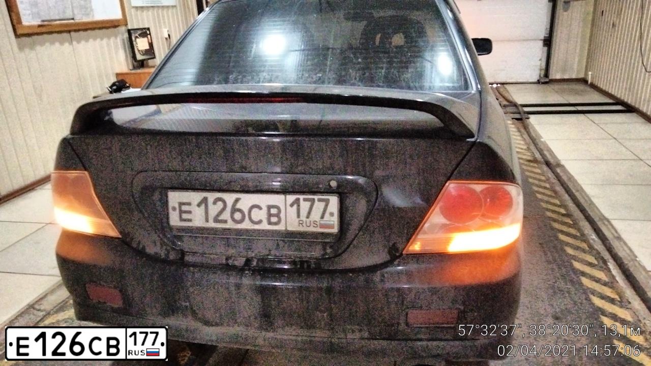 Фото автомобиля MITSUBISHI LANCER, 2007 — госномер О044МР76. Цвет: ЧЕРНЫЙ