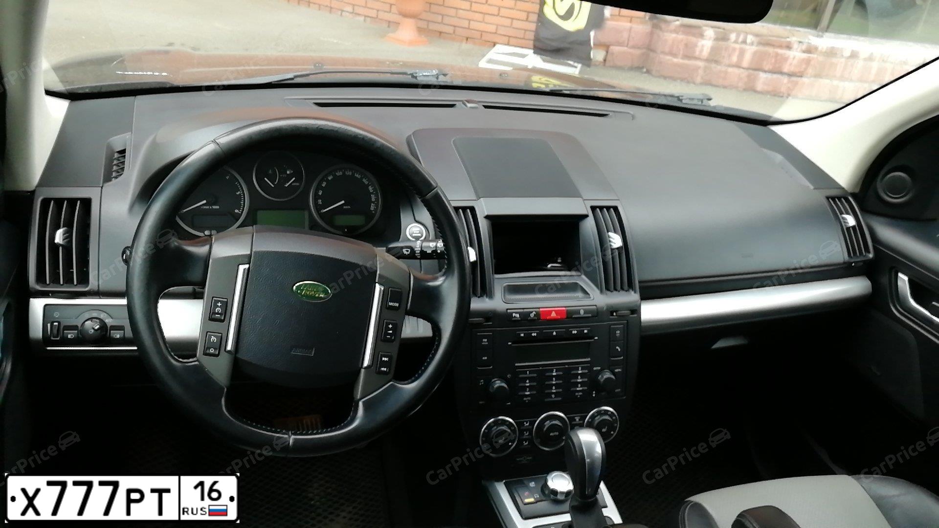 Фото автомобиля AUDI A5, 2010 — госномер К633НС702. Цвет: Красный