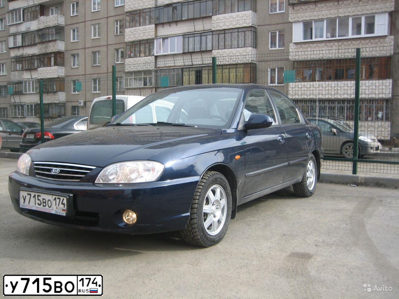 Фото автомобиля KIA SPECTRA, 2008 — госномер Е464НК30. Цвет: ТЕМНО-СИНИЙ