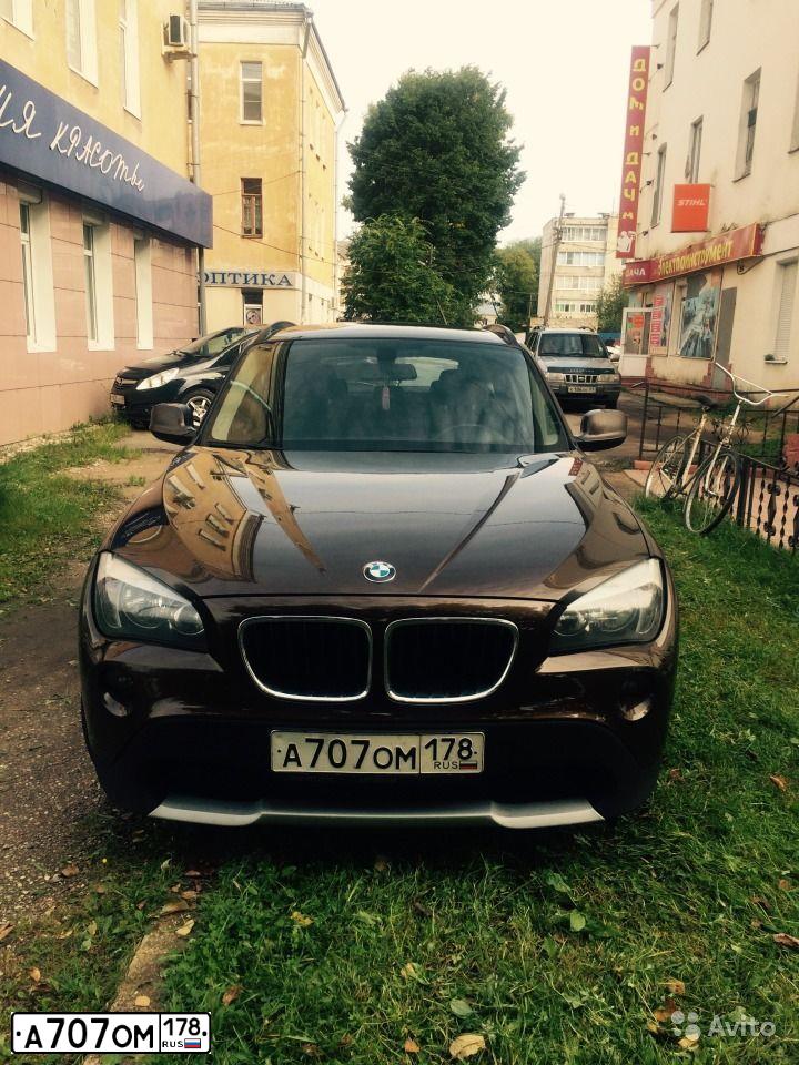 Фото автомобиля BMW X1, 2012 — госномер С460СЕ69. Цвет: Коричневый
