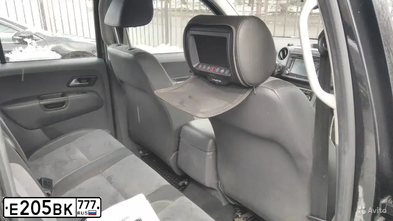 Фото автомобиля VOLKSWAGEN AMAROK, 2013 — госномер Е205ВК777. Цвет: ЧЕРНЫЙ