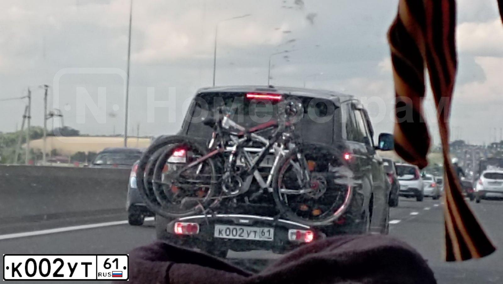 Фото автомобиля TOYOTA LANDCRUISER, 2010 — госномер К002УТ61. Цвет: Белый