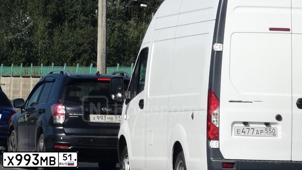 Фото автомобиля VOLKSWAGEN TIGUAN, 2010 — госномер Н660ОН10. Цвет: ЧЕРНЫЙ