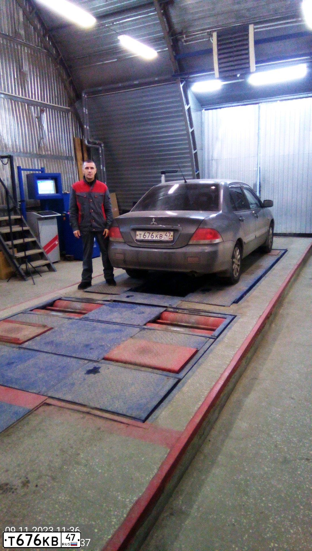 Фото автомобиля MITSUBISHI LANCER, 2006 — госномер Х628ТЕ72. Цвет: СЕРЫЙ