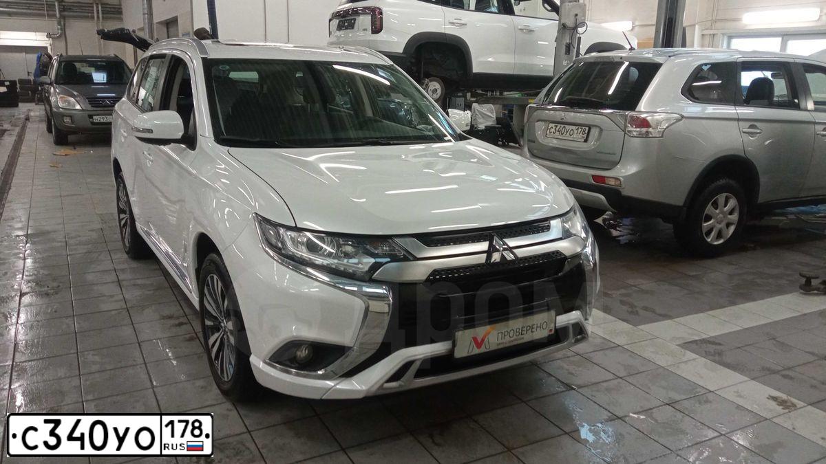 Фото автомобиля MITSUBISHI OUTLANDER, 2014 — госномер С340УО178. Цвет: Серебристый