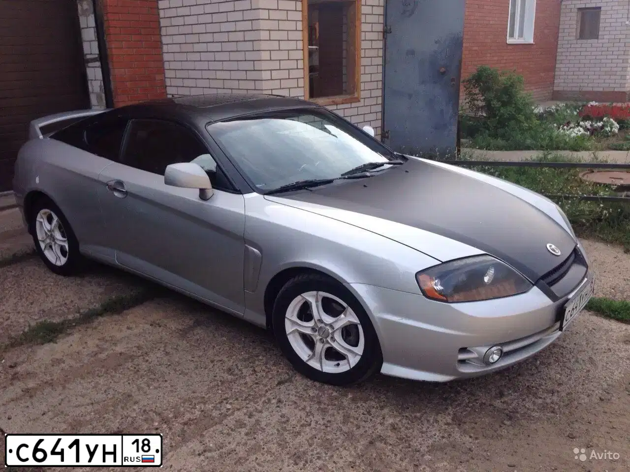 Фото автомобиля HYUNDAI TIBURON, 2003 — госномер Е563НХ156
