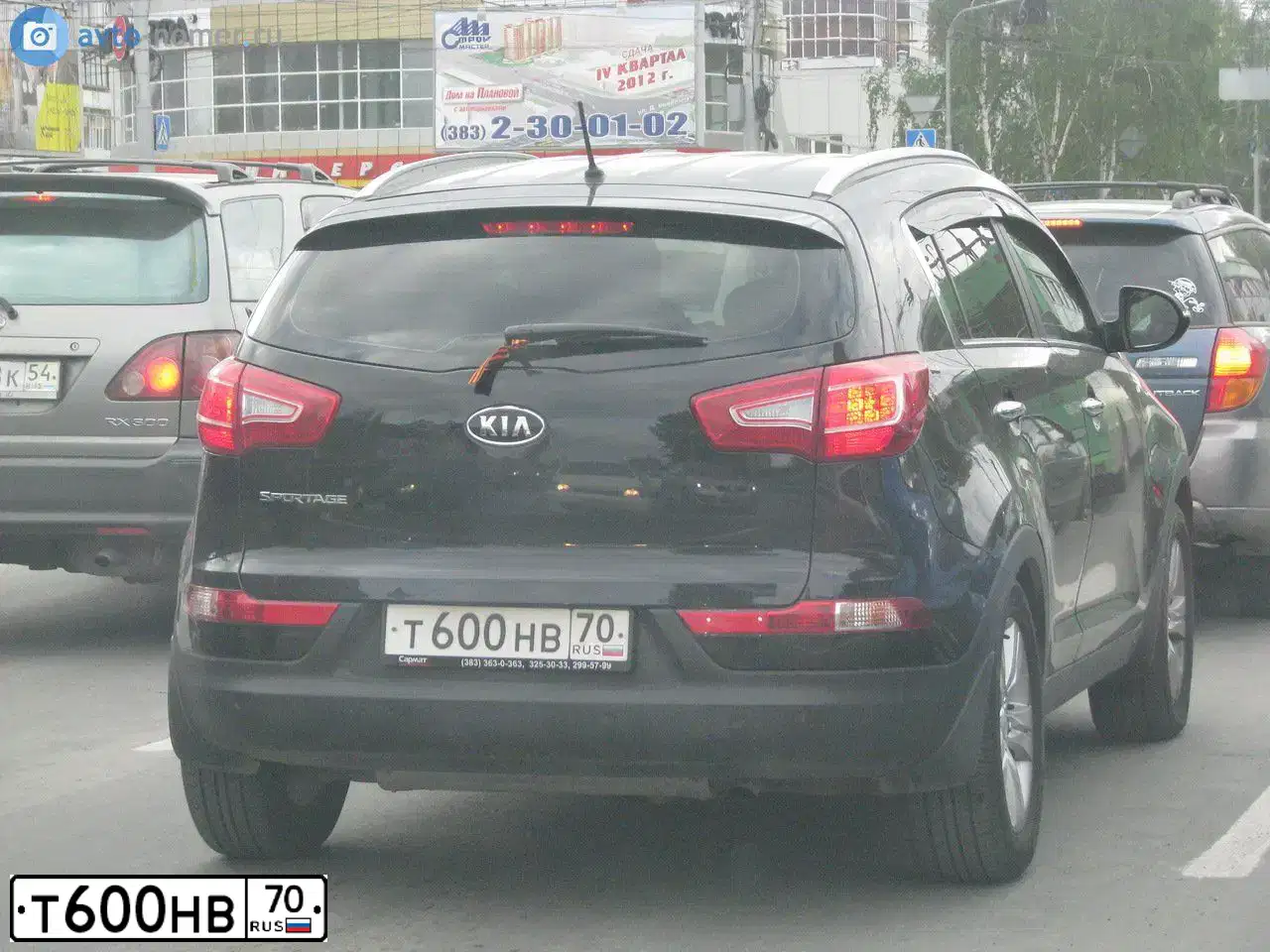 Фото автомобиля KIA SPORTAGE, 2010 — госномер Т600НВ70. Цвет: ЧЕРНЫЙ