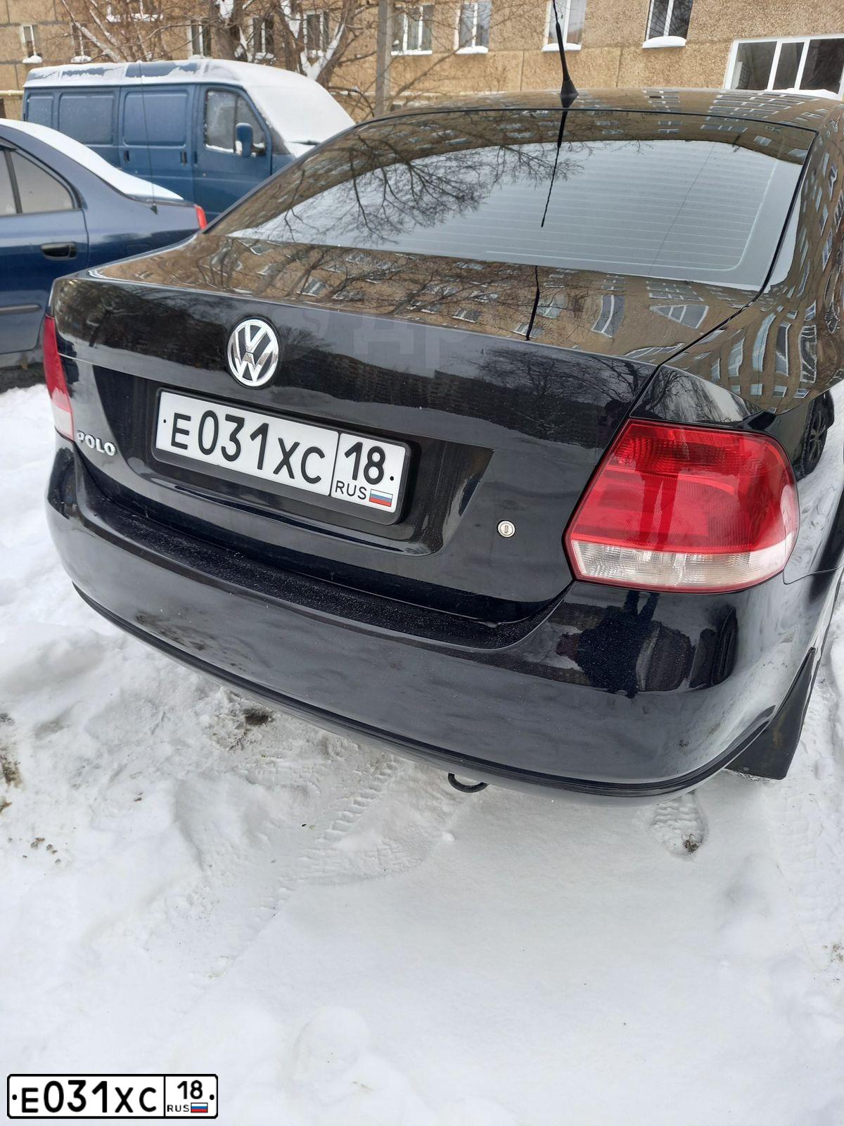 Фото автомобиля VOLKSWAGEN POLO, 2012 — госномер Н525АА702. Цвет: ЧЕРНЫЙ