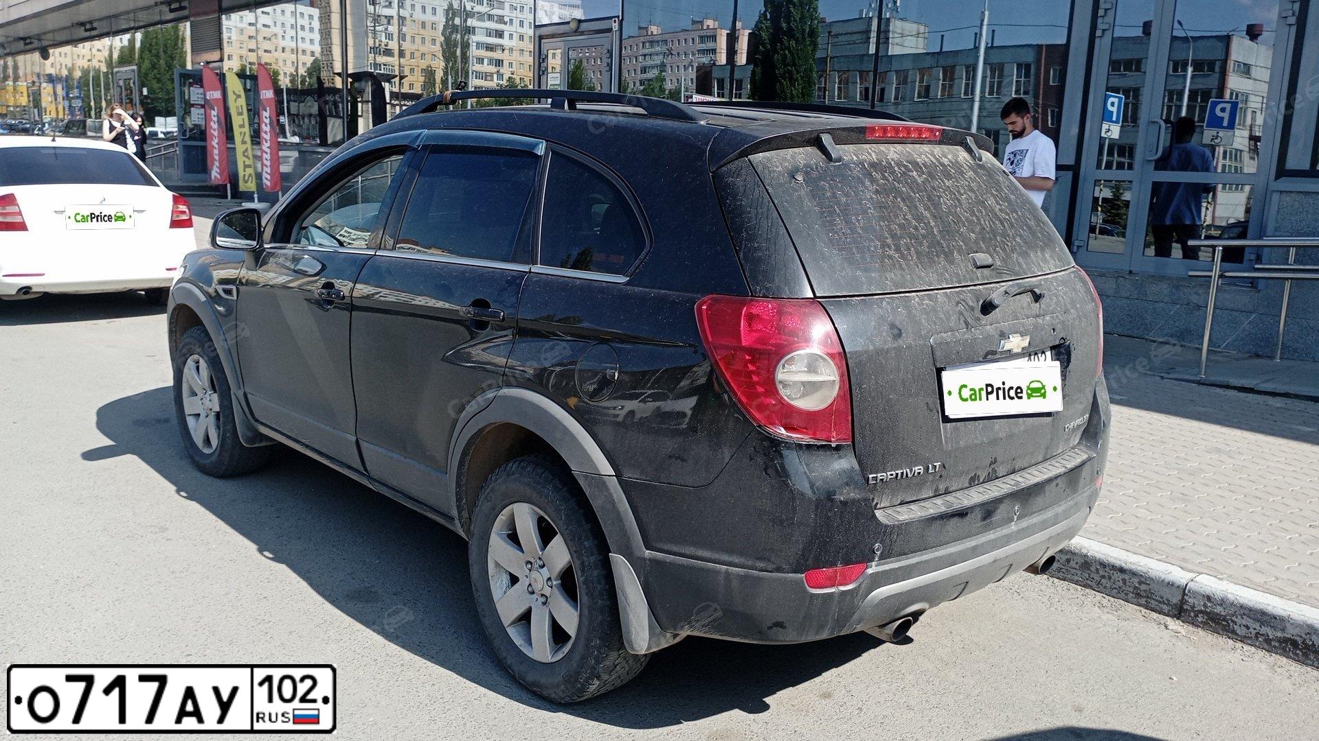 Фото автомобиля CHEVROLET CAPTIVA, 2012 — госномер О717АУ102. Цвет: ЧЕРНЫЙ
