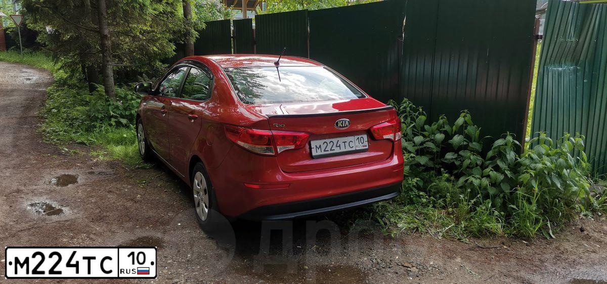 Фото автомобиля KIA RIO, 2015 — госномер Р811ЕВ68. Цвет: Красный