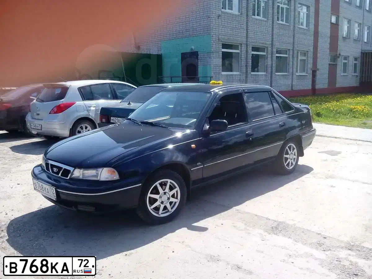 Фото автомобиля DAEWOO NEXIA, 2005 — госномер В768КА72. Цвет: синий
