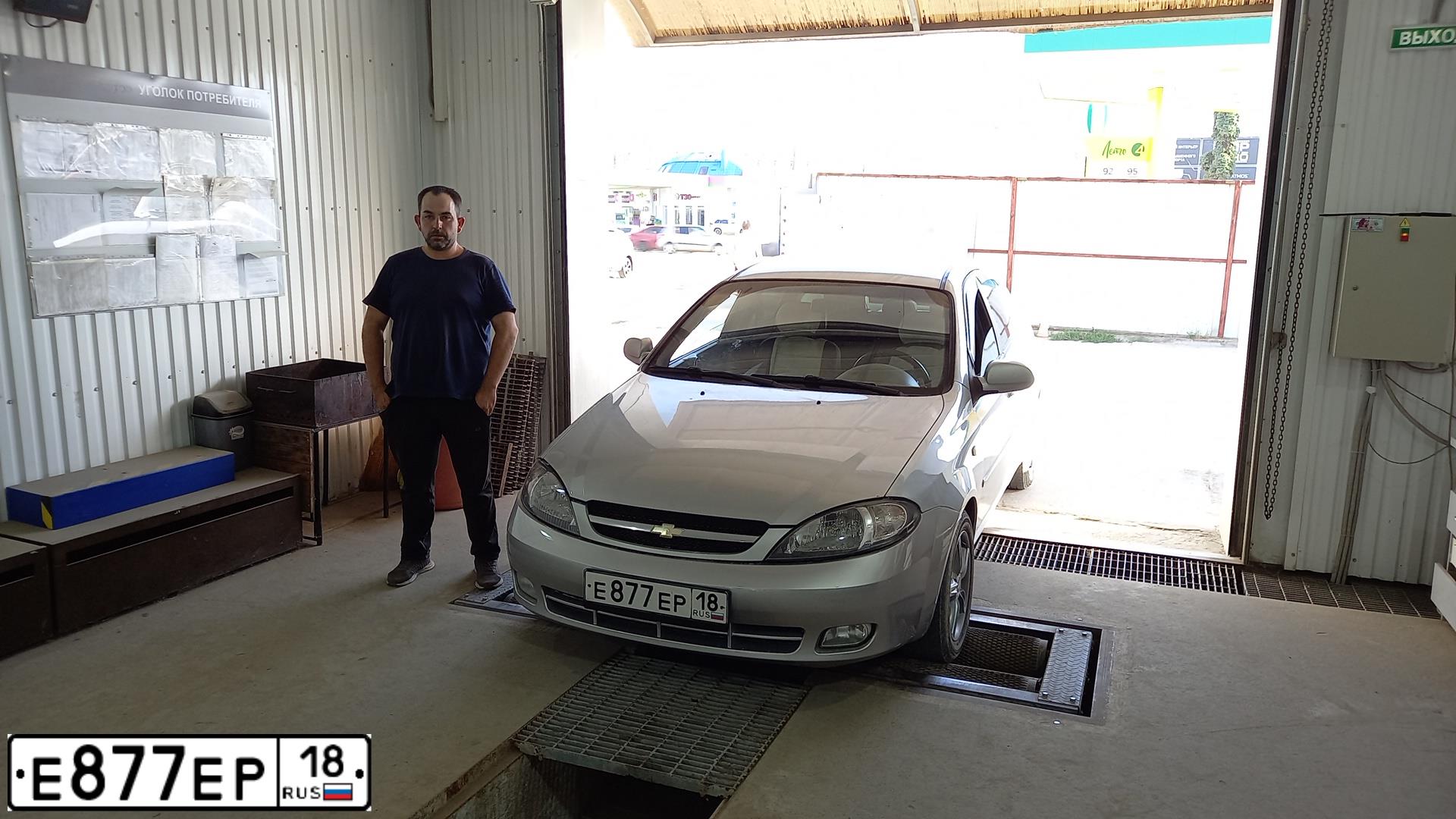 Фото автомобиля CHEVROLET T LACETTI, 2006 — госномер Е877ЕР18. Цвет: СЕРЕБРИСТЫЙ